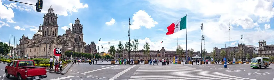 Panorama of the Zócalo with the Cathedral, the giant flag and the National Palace