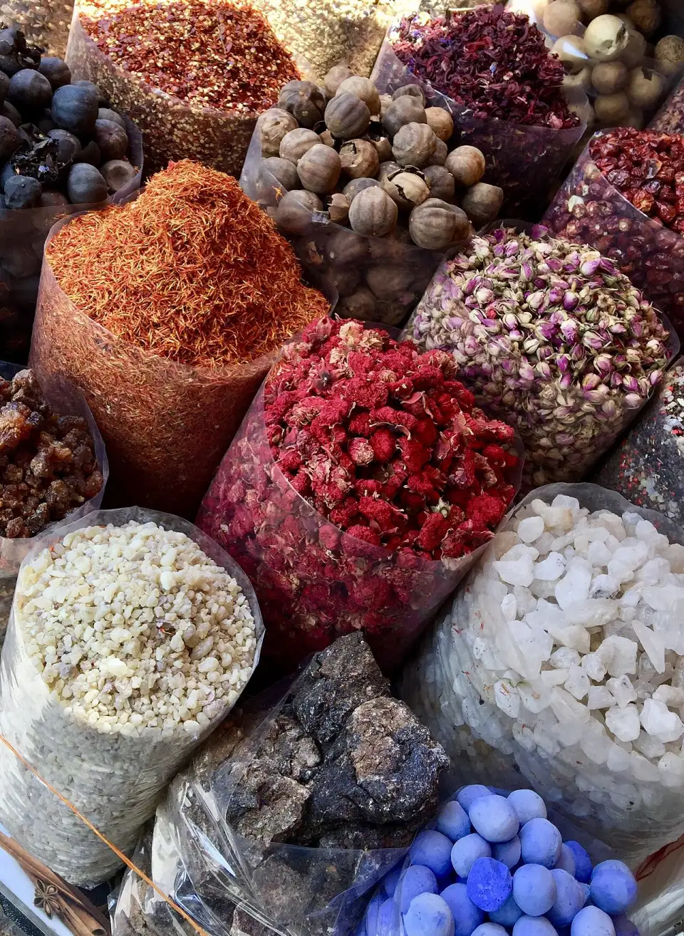 Frankincense, dried limes, roses and saffron for sale in the souk