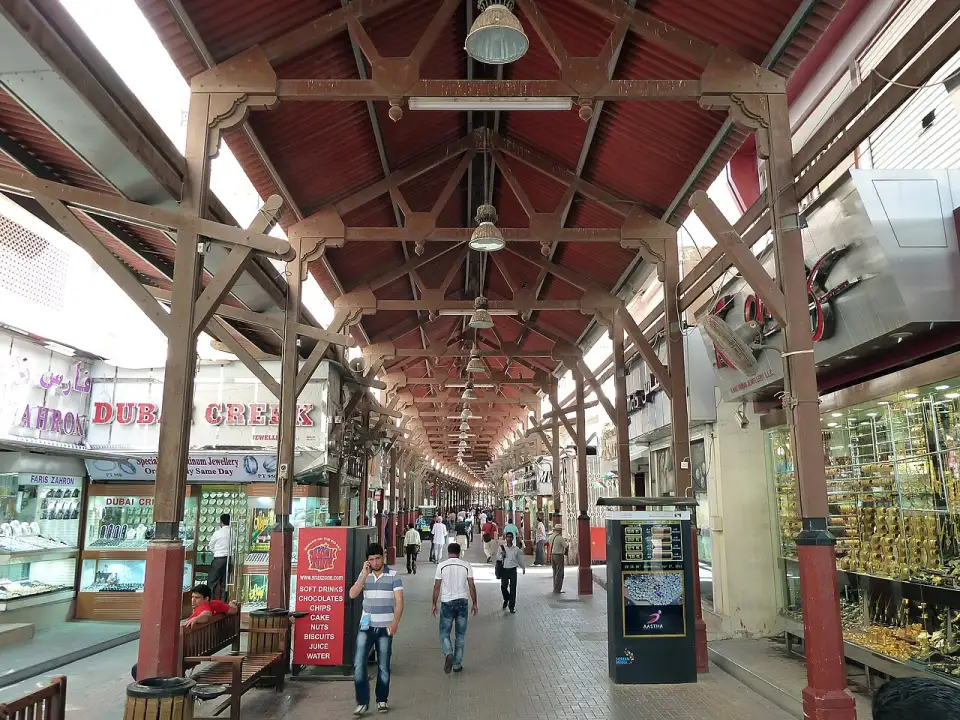 Main lane of the Gold Souk under its wooden roof