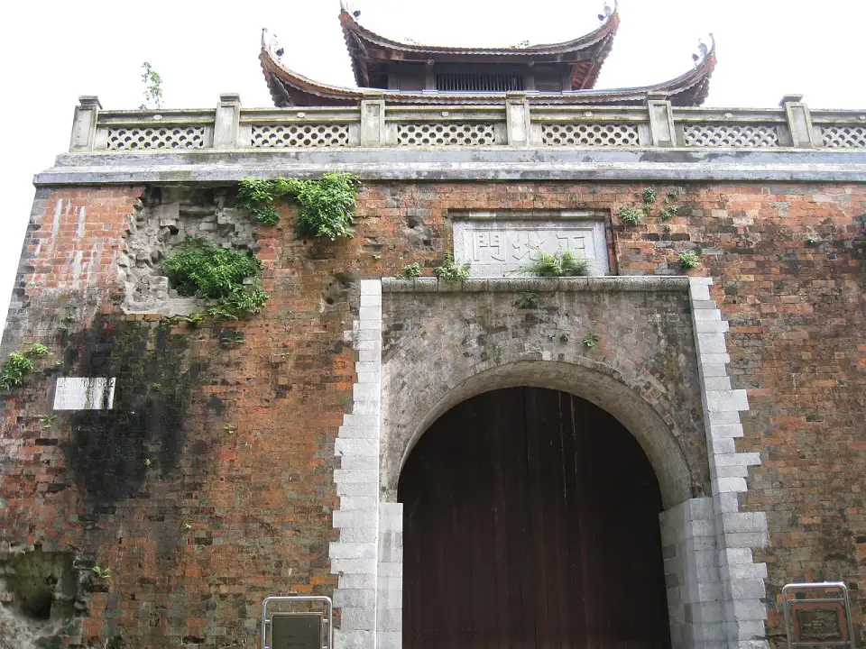 Wall of the North Gate showing the marks of French shells