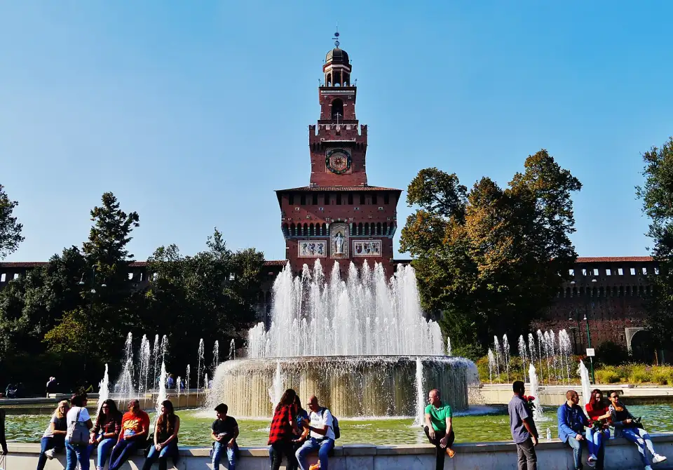 Filarete Tower of Castello Sforzesco behind the Piazza Castello fountain