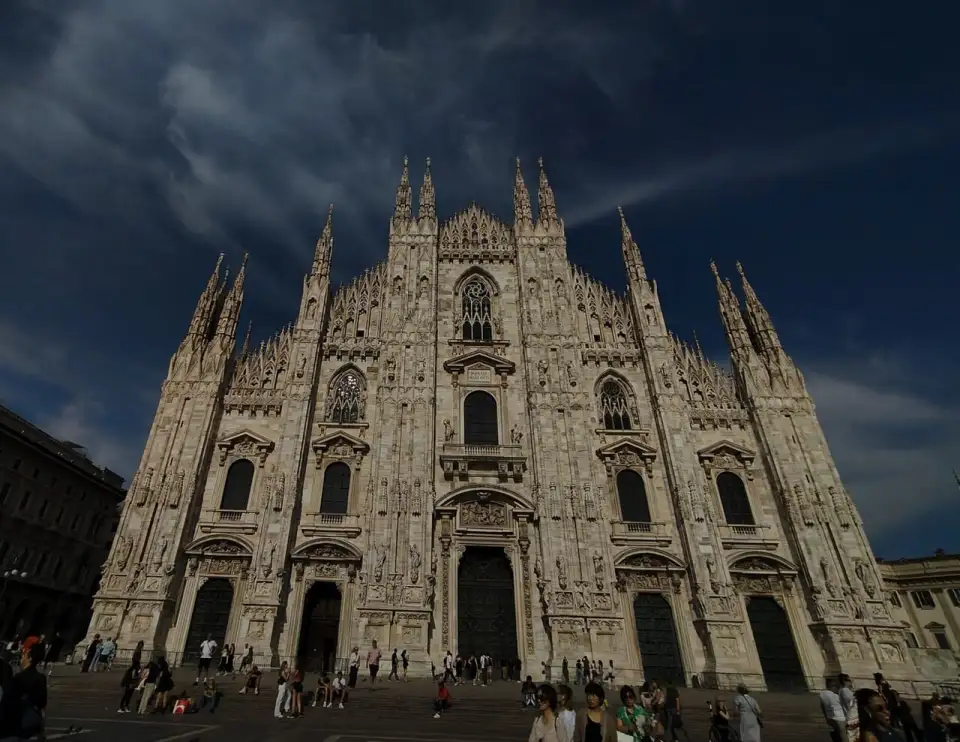 Marble façade of Milan Cathedral with its spires