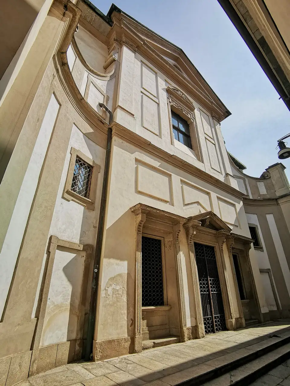 Pale façade of the church of San Bernardino alle Ossa