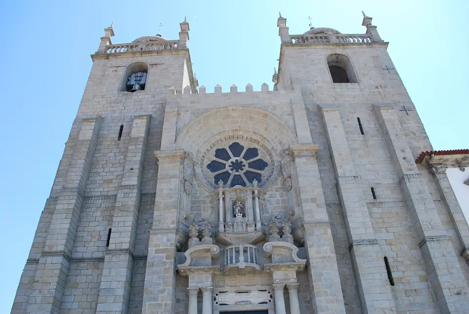 Main façade of Porto Cathedral with its two towers and rose window