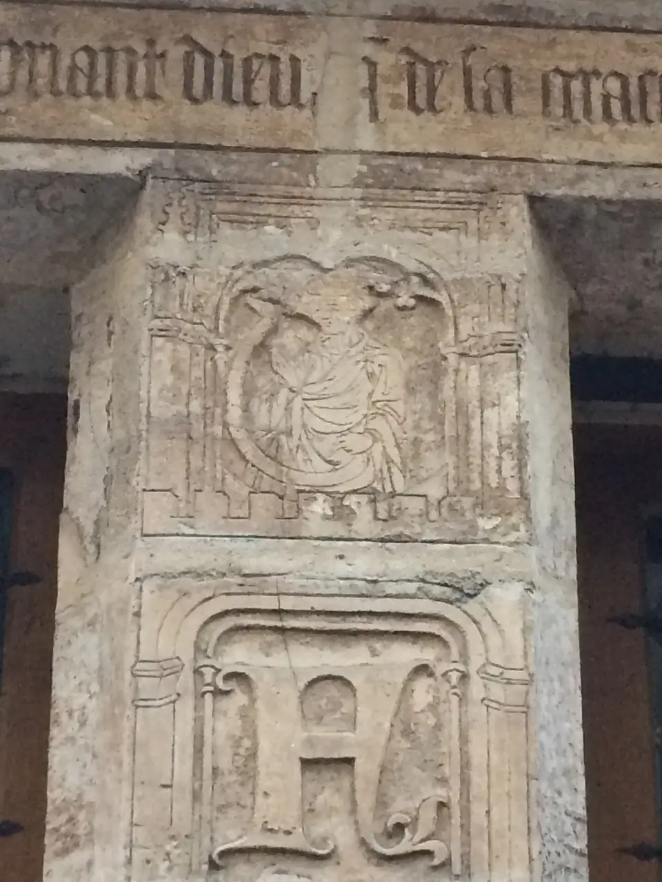 Carved pillar and Gothic inscription on Flamel's house