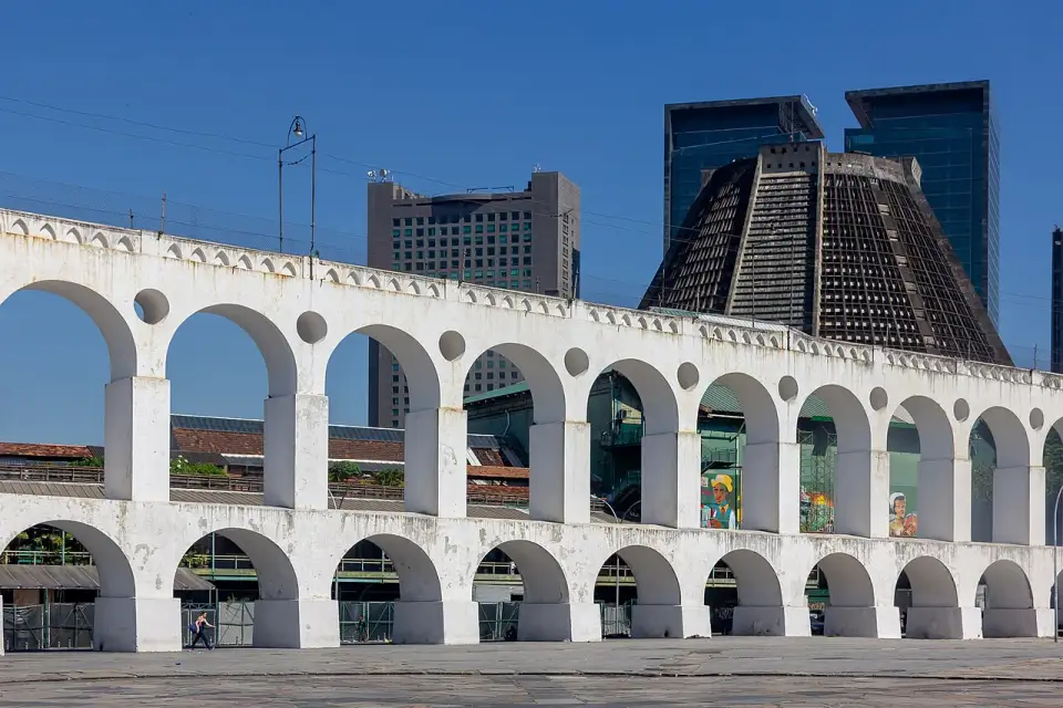 The white Lapa Arches with the cone-shaped cathedral behind