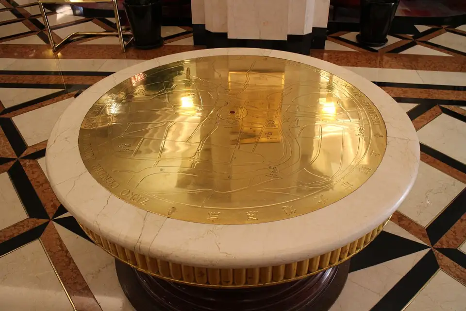 Brass disc with a map of Shanghai marking the zero point in the Park Hotel lobby