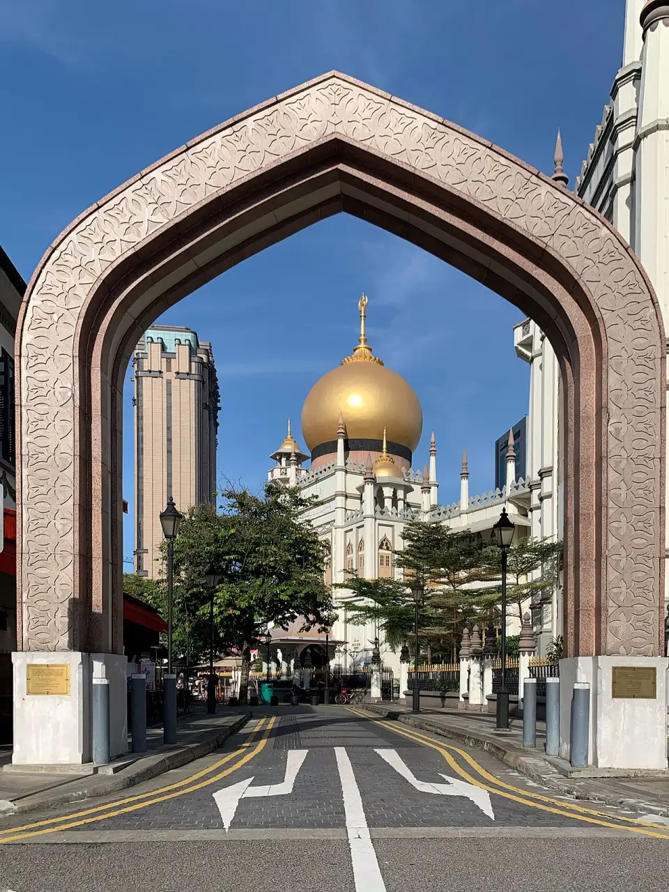 Sultan Mosque's golden dome framed by the Muscat Street arch