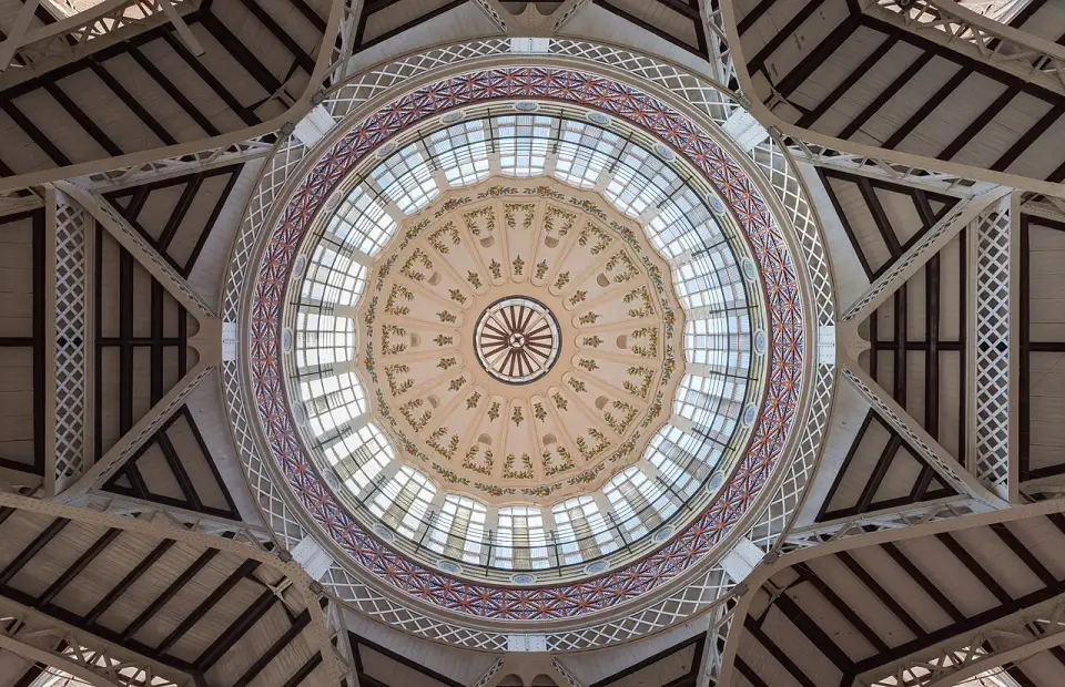 The great iron and glass dome of the Central Market seen from inside