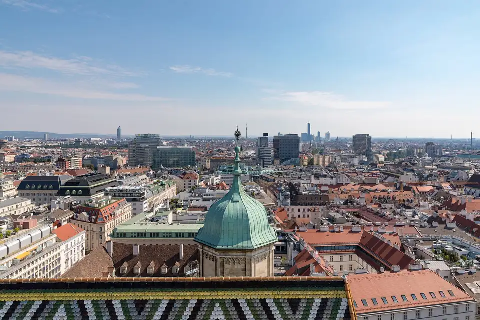 Vienna's rooftops seen from the south tower of St Stephen's Cathedral, with the coloured tile roof in the foreground