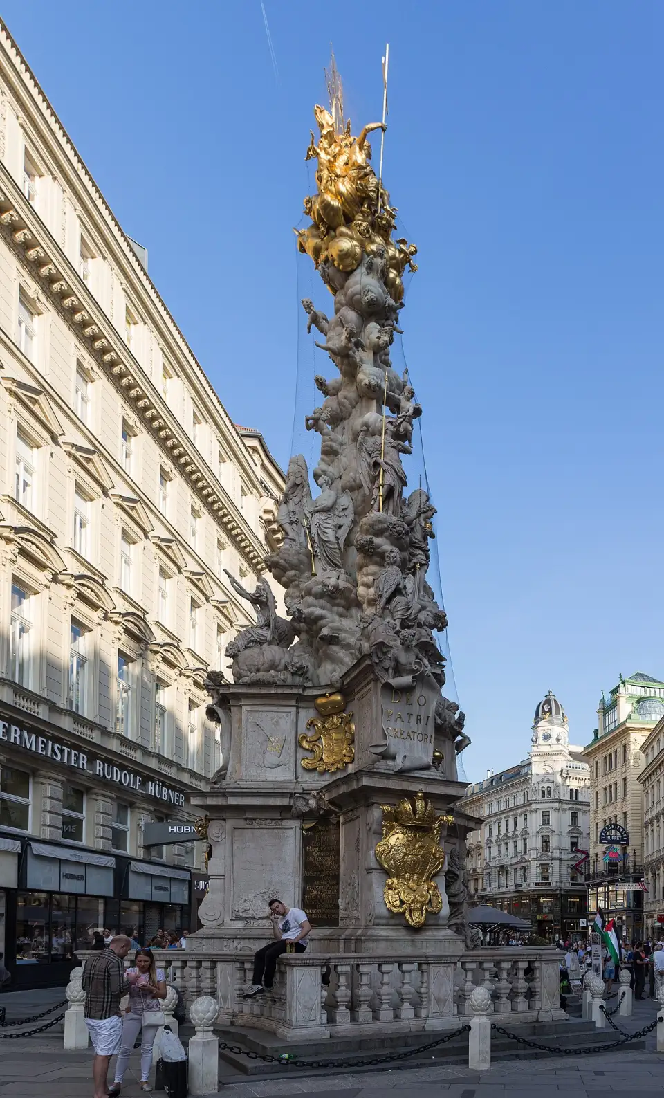 The Plague Column on the Graben, in white marble with clouds, angels and the gilded Trinity at the top